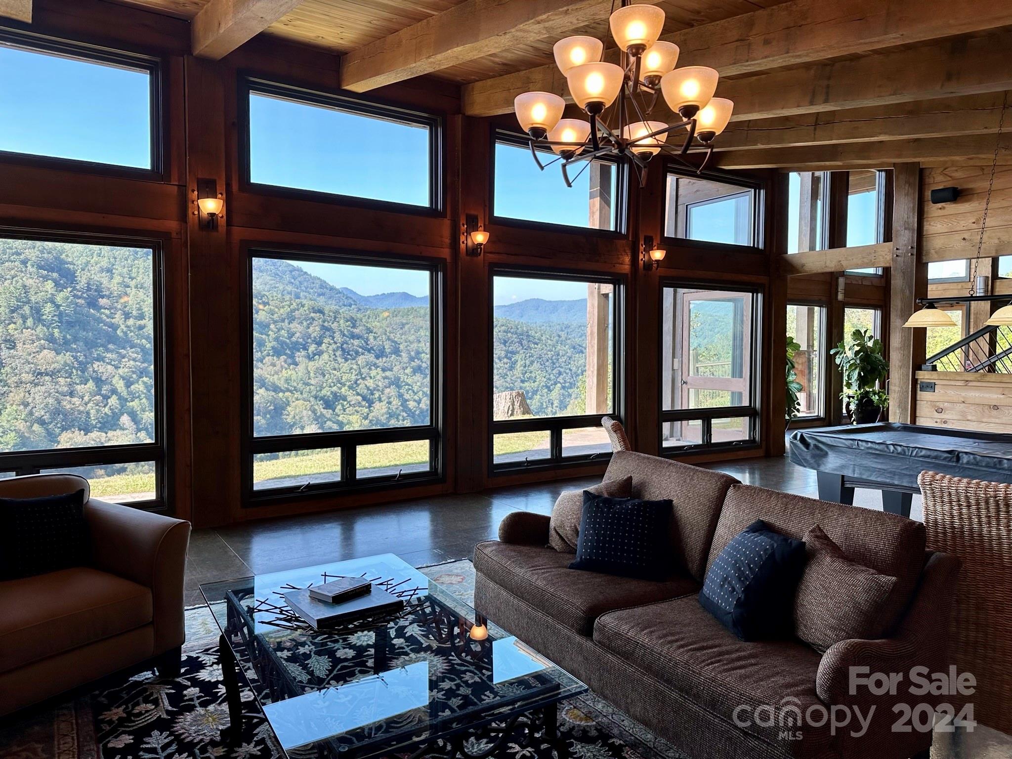 151 Wild Turkey Loop, Unit 29 Marshall, NC 28753 - Photo 20 of 25 a living room with furniture and a large window