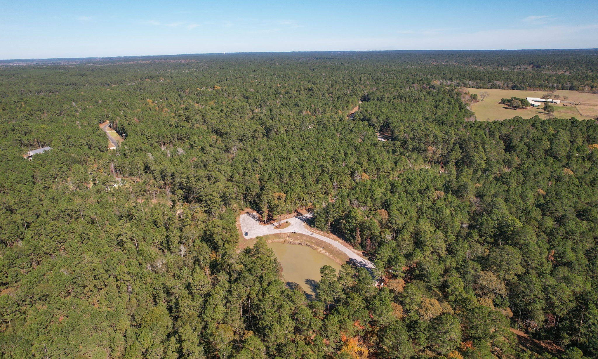 Lot 189 Branding Iron Road Huntsville, TX 77340 - Photo 29 of 48 an aerial view of residential houses with outdoor space and trees