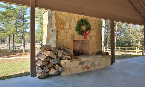 a view of an empty room and floor to ceiling window