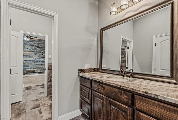 a bathroom with a tub and shower