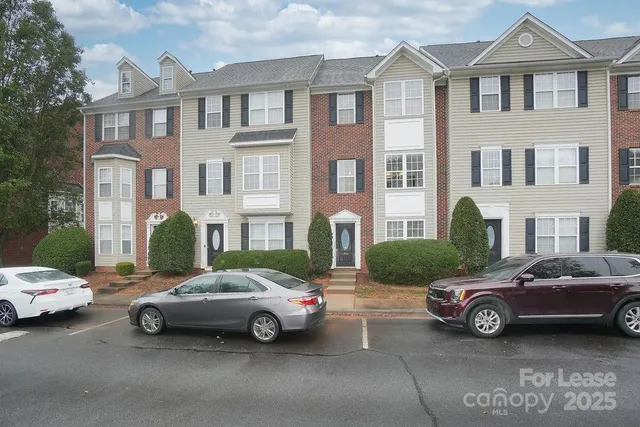 a car parked in front of a house