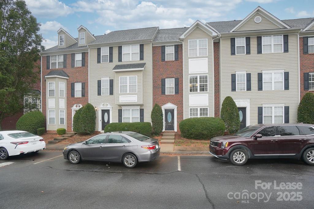 9858 Treeside Lane Matthews, NC 28105 - Photo 2 of 22 a car parked in front of a house