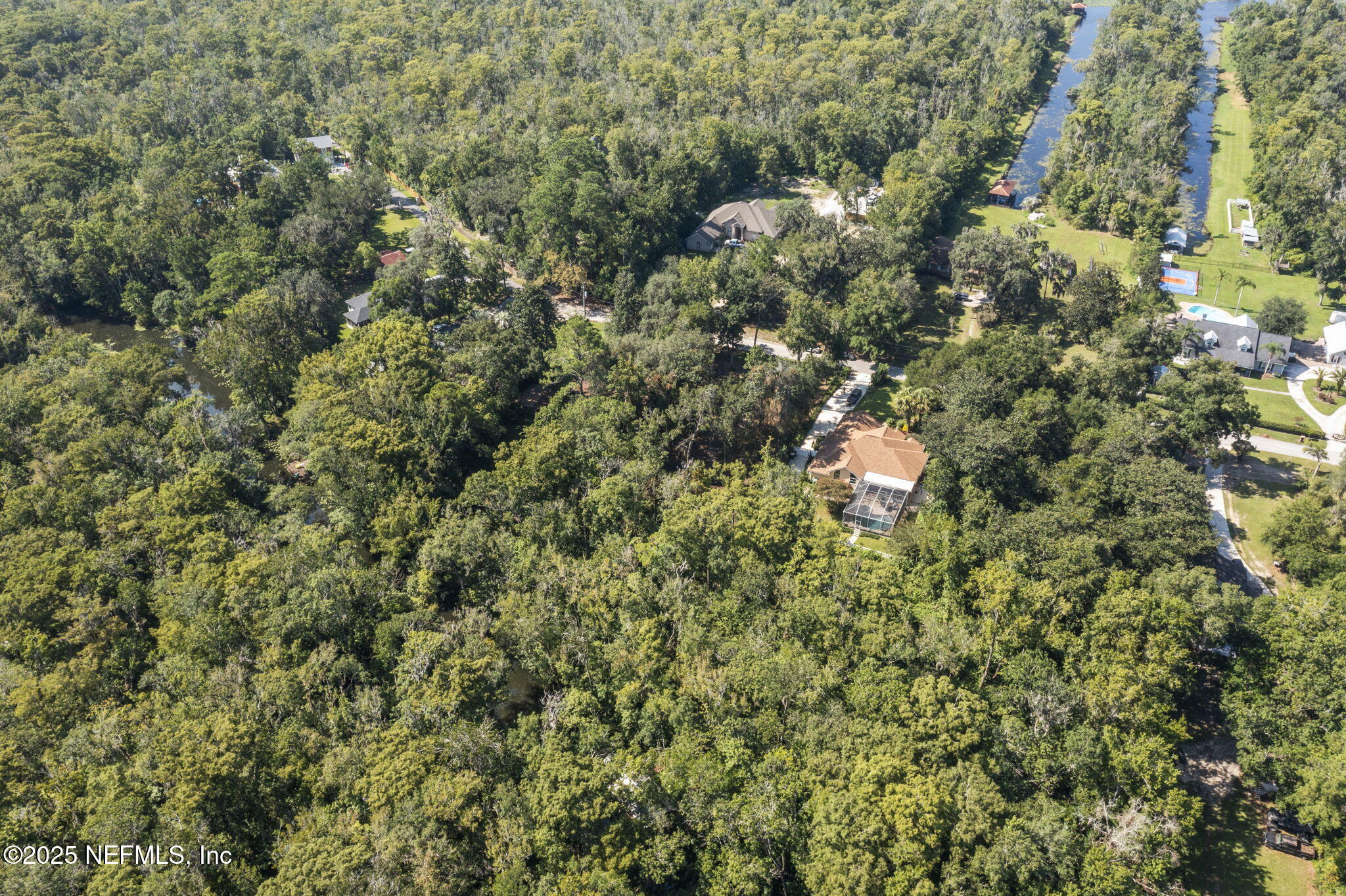 0 Hillwood Road Jacksonville, FL 32223 - Photo 16 of 35 a view of a house with a tree
