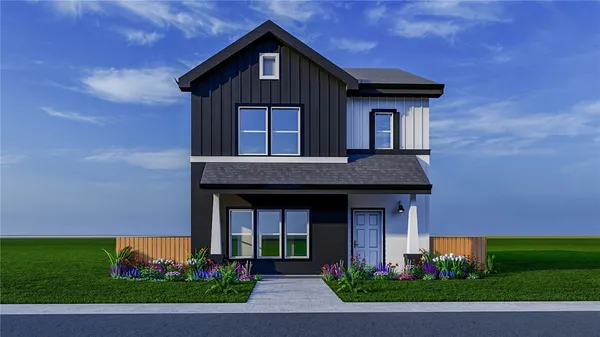 a front view of a house with a yard and potted plants