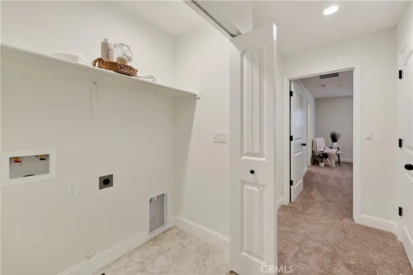 a view of a hallway with closet area