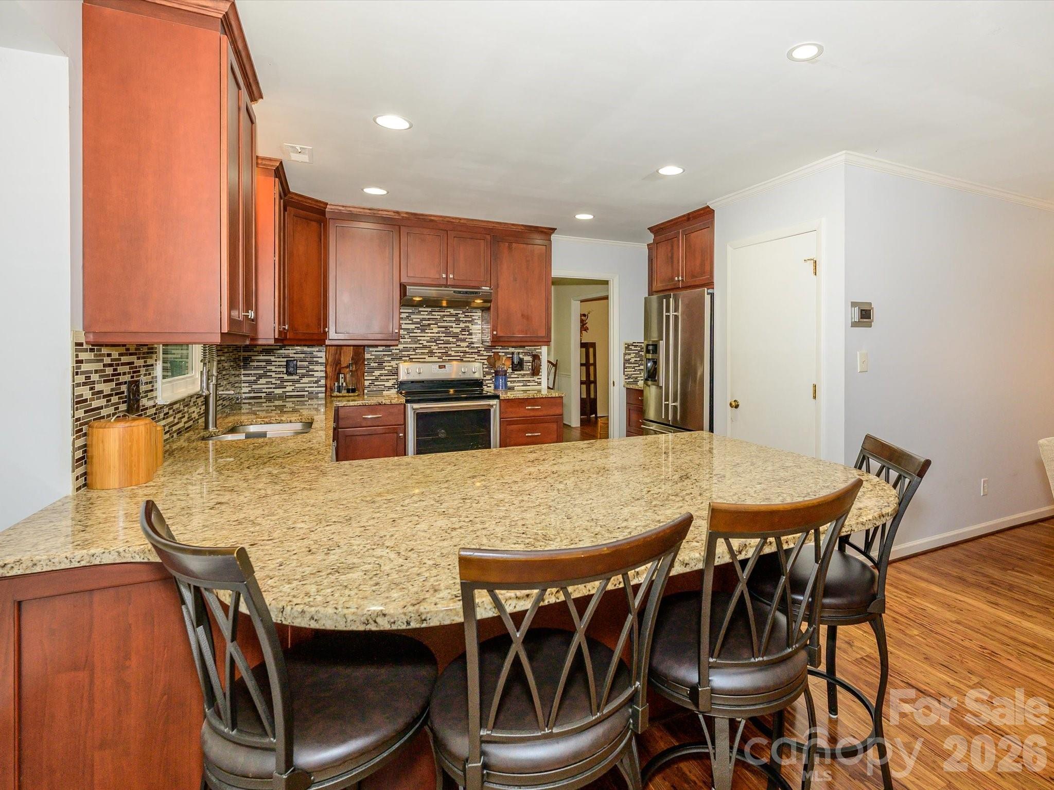 9607 Riddick Place Matthews, NC 28105 - Photo 19 of 39 a view of a dining room with furniture