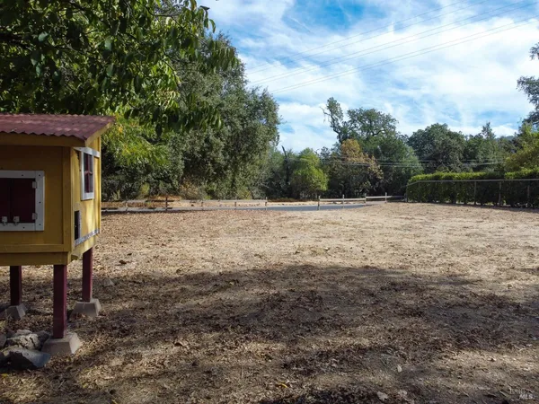 a view of a wooden floor with a yard