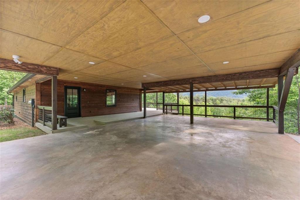 707 South Fern Cove Road Sautee Nacoochee, GA 30571 - Photo 39 of 60 a view of an empty room with a balcony