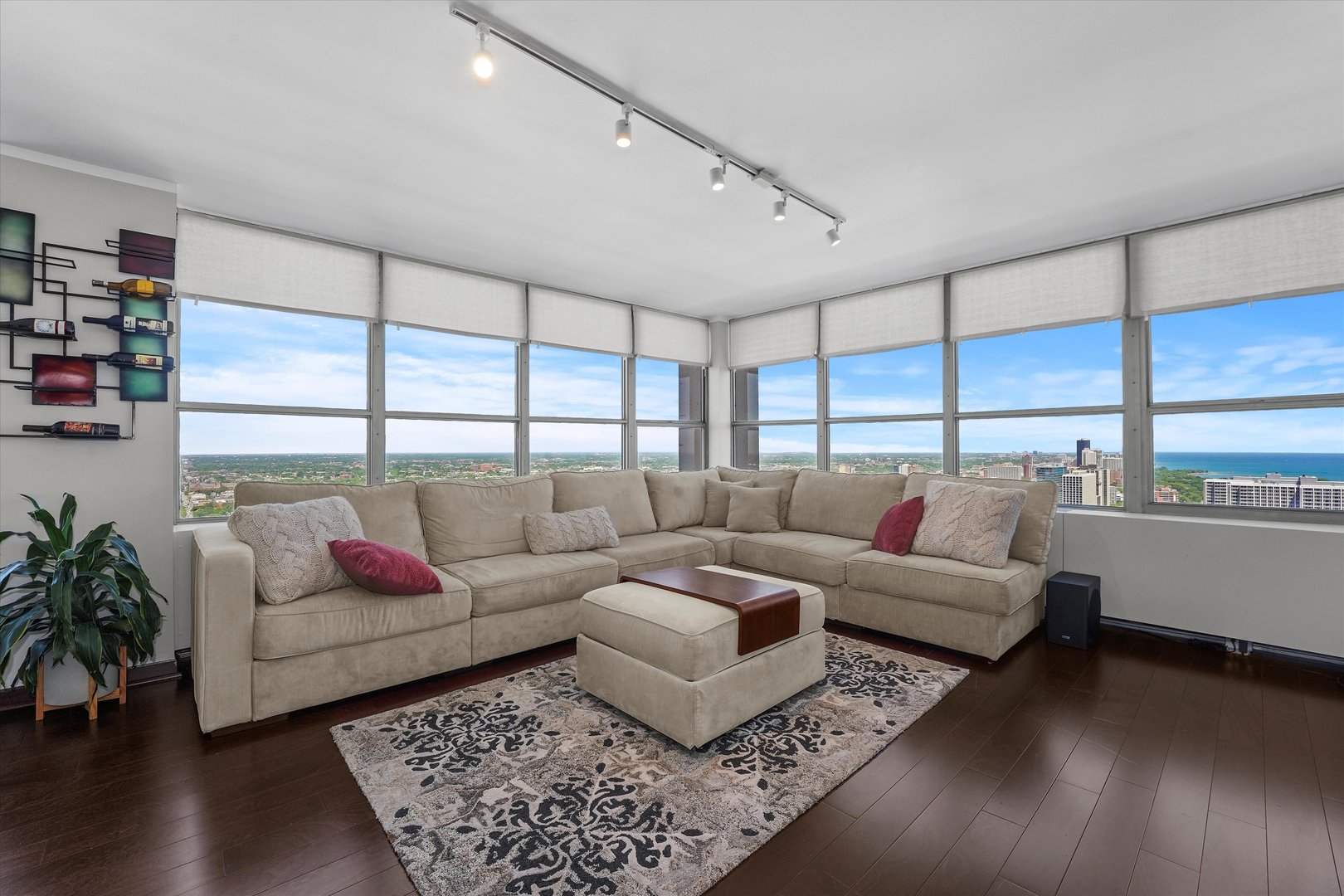 655 West Irving Park Road, Unit 3916 Chicago, IL 60613 - Photo 4 of 17 a living room with furniture and a large window