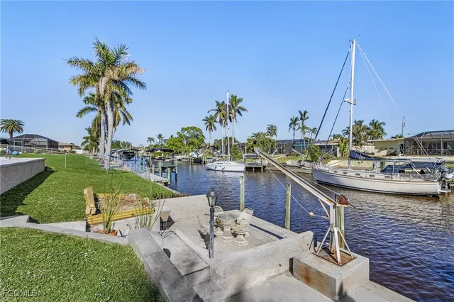 a view of outdoor space with seating area and swimming pool