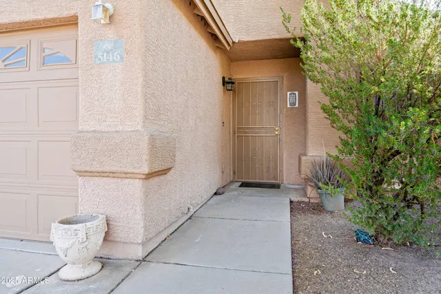 a view of a back yard of the house