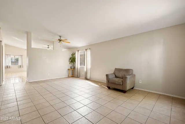 a kitchen with stainless steel appliances granite countertop a refrigerator a sink a stove a microwave and island