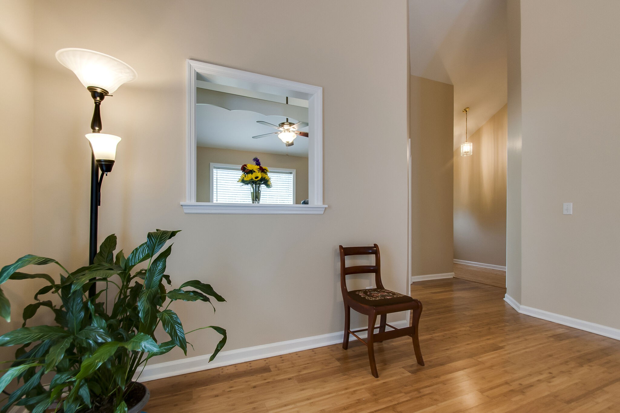 7487 Christopher Street Fairview, TN 37062 - Photo 12 of 27 a living room with furniture and a potted plant