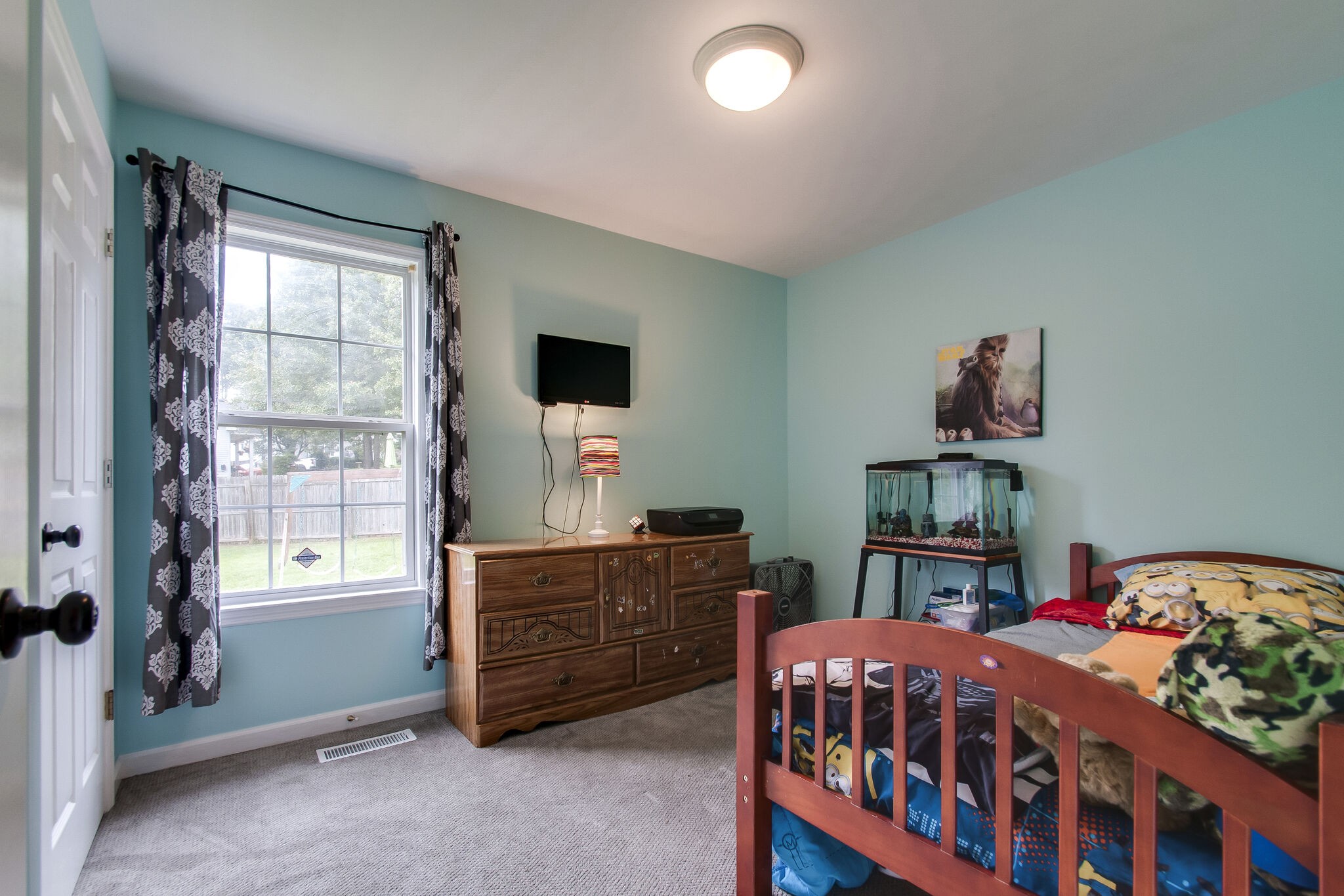 7487 Christopher Street Fairview, TN 37062 - Photo 21 of 27 a bedroom with furniture and a window