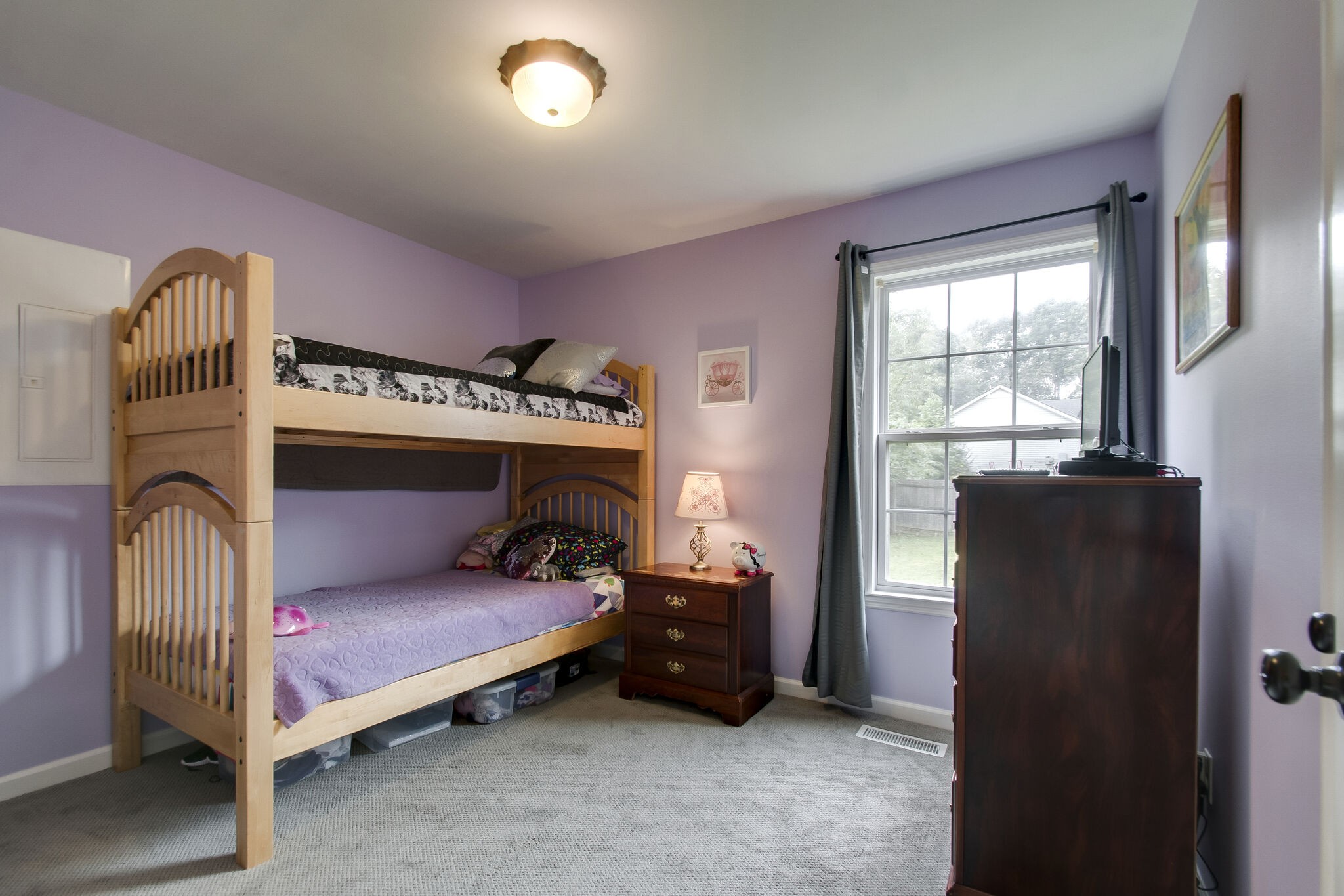 7487 Christopher Street Fairview, TN 37062 - Photo 22 of 27 a bedroom with a bed and a window