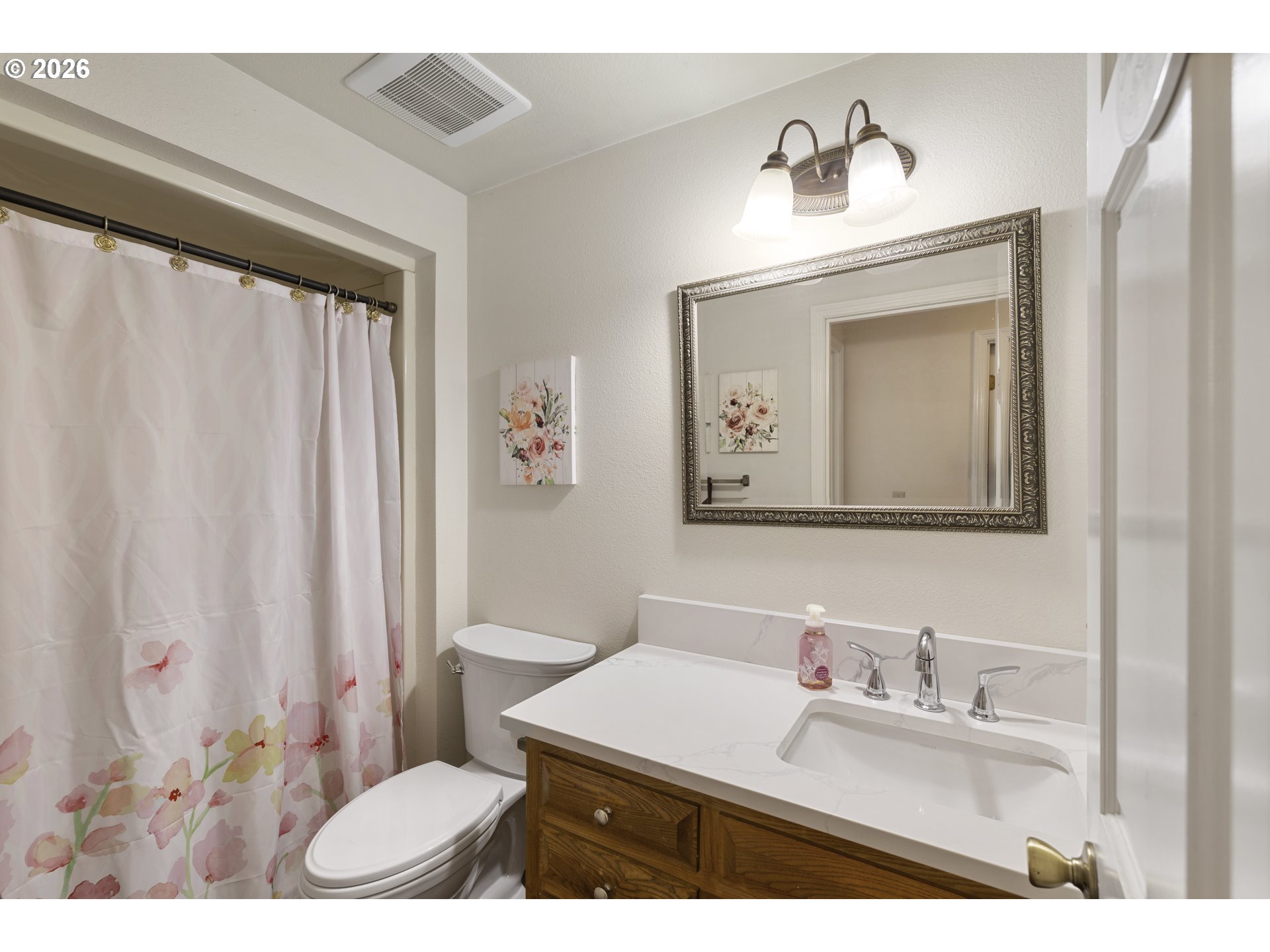 4515 Cordon Road Northeast Salem, OR 97305 - Photo 25 of 48 a bathroom with a sink vanity mirror and toilet