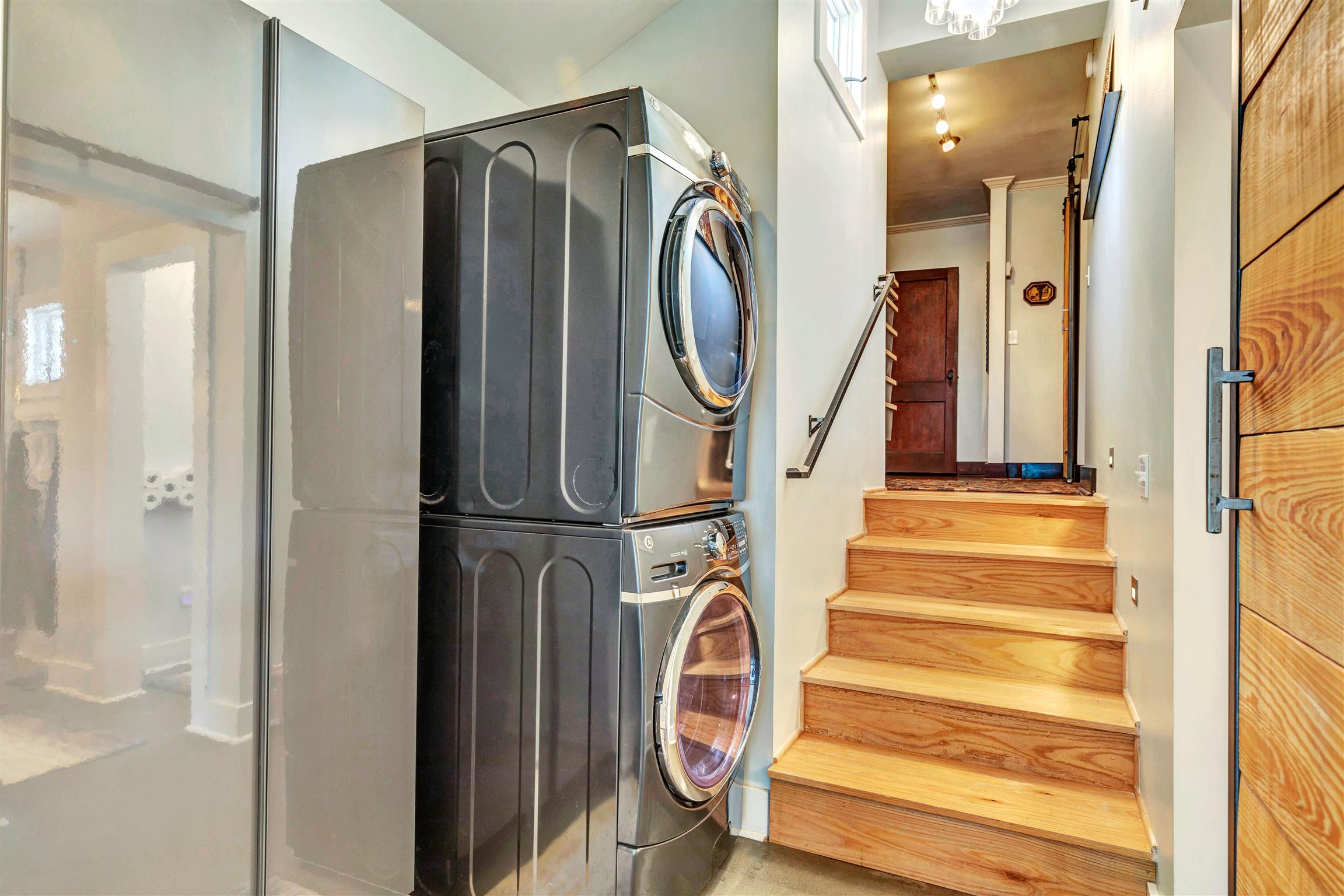 255 Cherokee Road Nashville, TN 37205 - Photo 14 of 30 a utility room with wooden floor washer and dryer