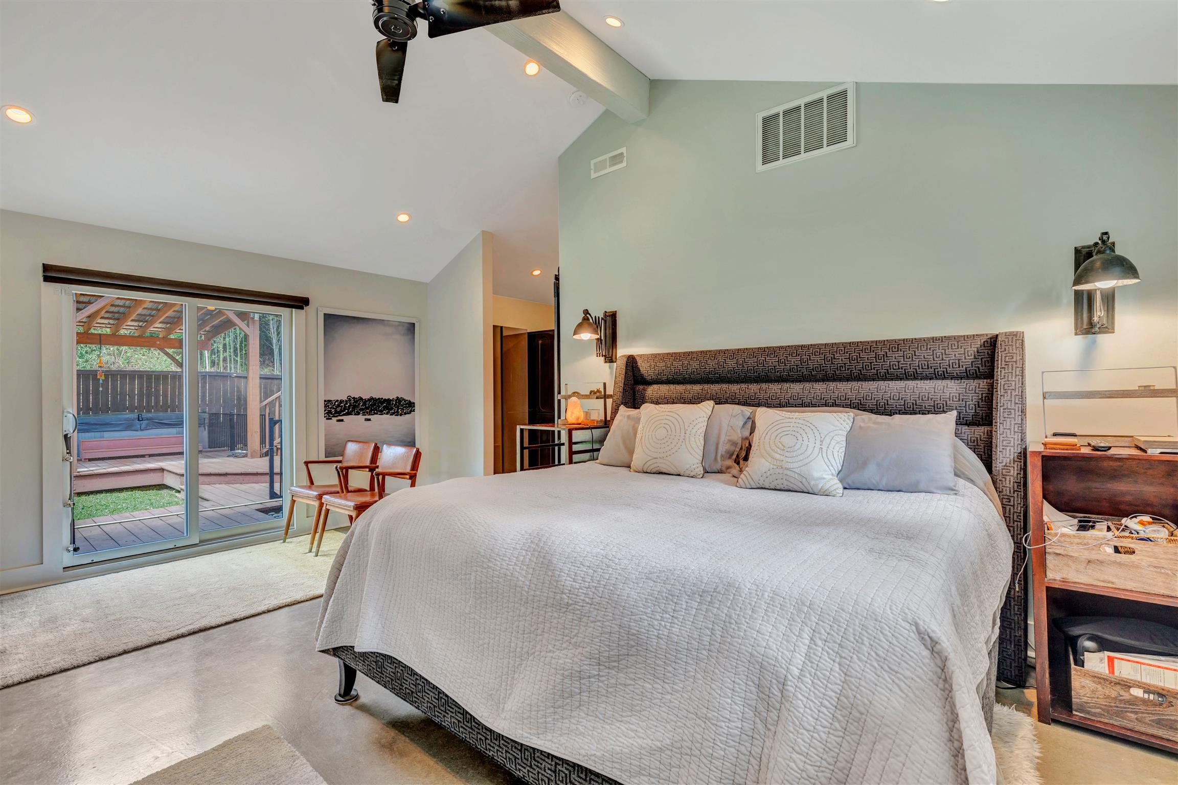 255 Cherokee Road Nashville, TN 37205 - Photo 15 of 30 a bedroom with a bed a lamp and window