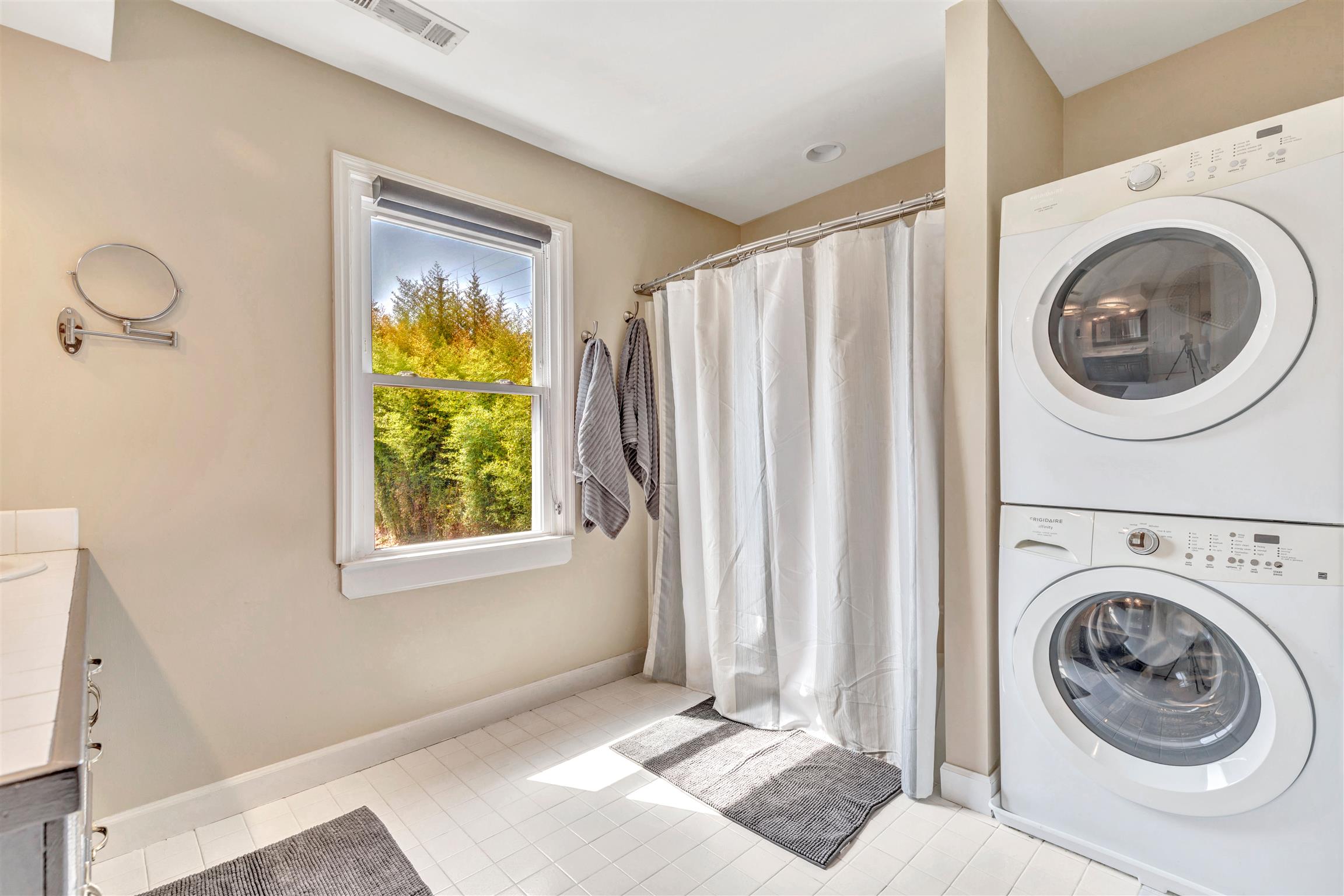 255 Cherokee Road Nashville, TN 37205 - Photo 23 of 30 a view of a bedroom with washer and dryer