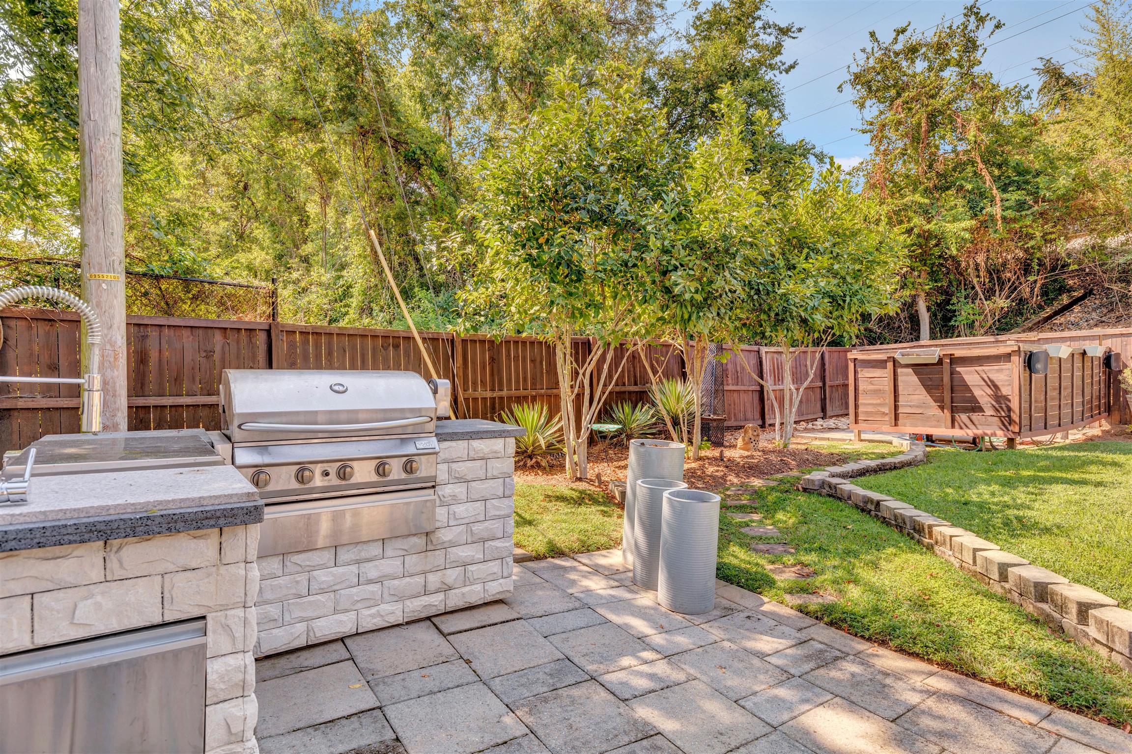 255 Cherokee Road Nashville, TN 37205 - Photo 27 of 30 a view of a backyard with sitting area