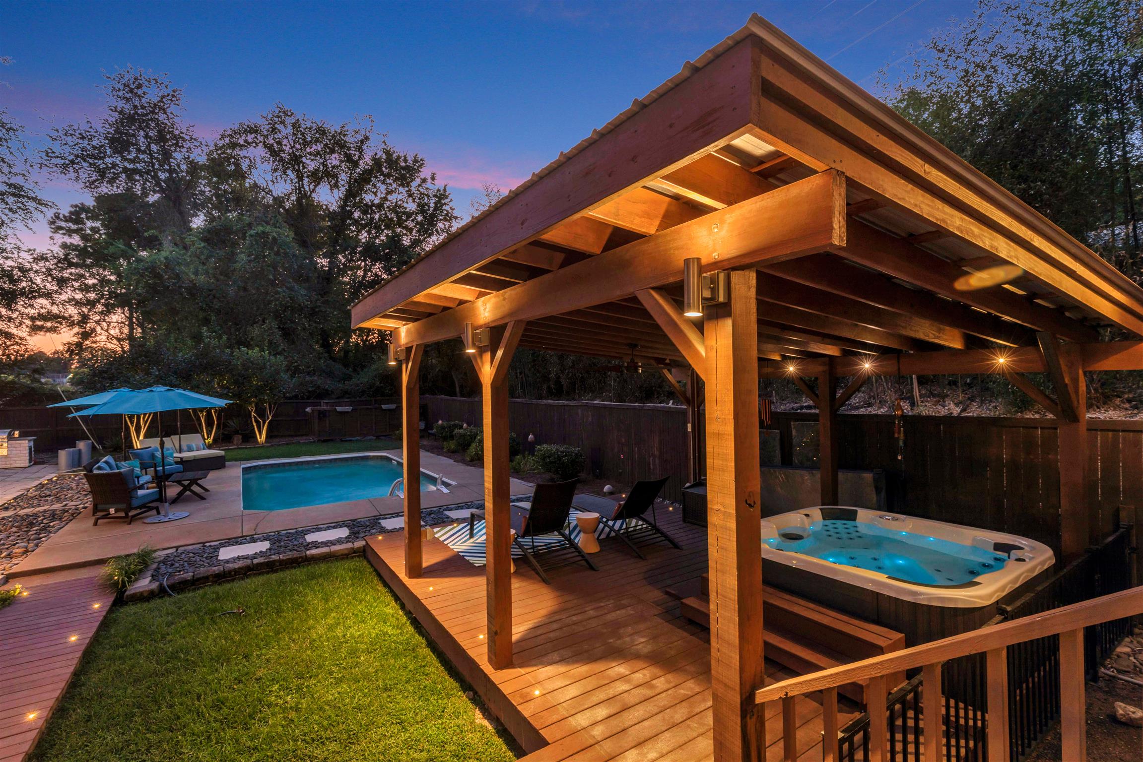 255 Cherokee Road Nashville, TN 37205 - Photo 4 of 30 a view of a patio with a table chairs and a swimming pool