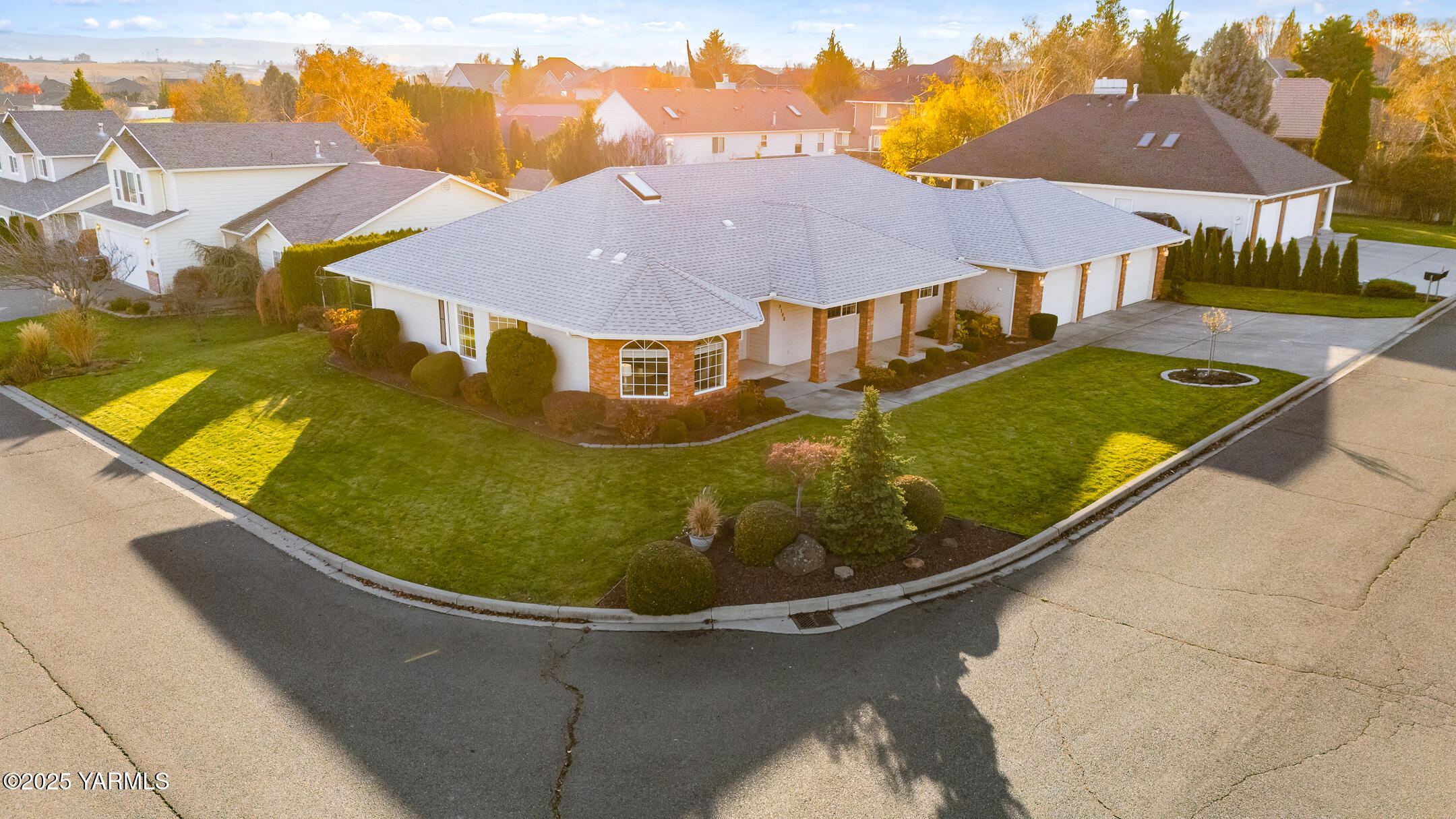 a view of a swimming pool with lounge chairs in patio