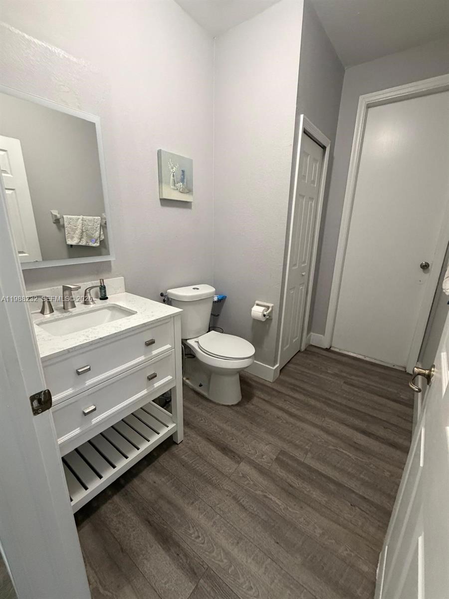 10837 Southwest 242nd Street Homestead, FL 33032 - Photo 6 of 19 a view of a bathroom with a sink and a toilet