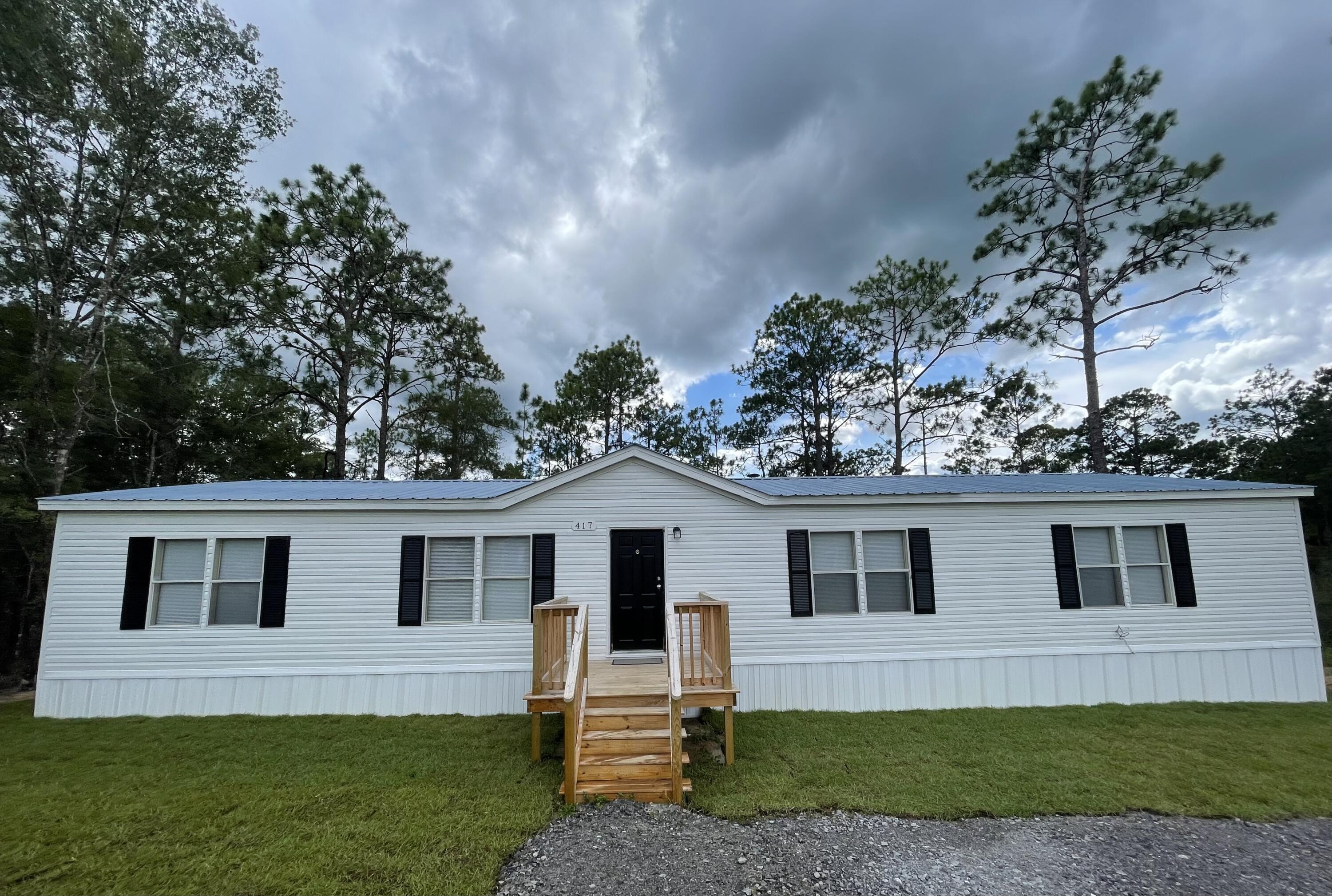 417 Howlin Road DeFuniak Springs, FL 32433 - Photo 1 of 16 Front of Home