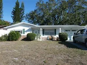 a view of a house with a patio