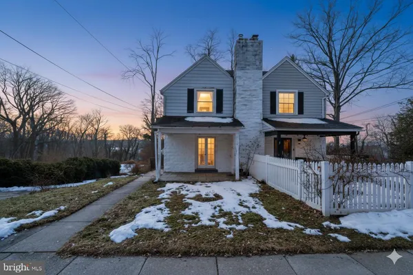 a front view of a house with yard