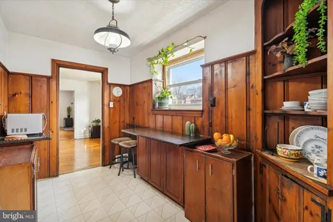a view of a kitchen and dining table