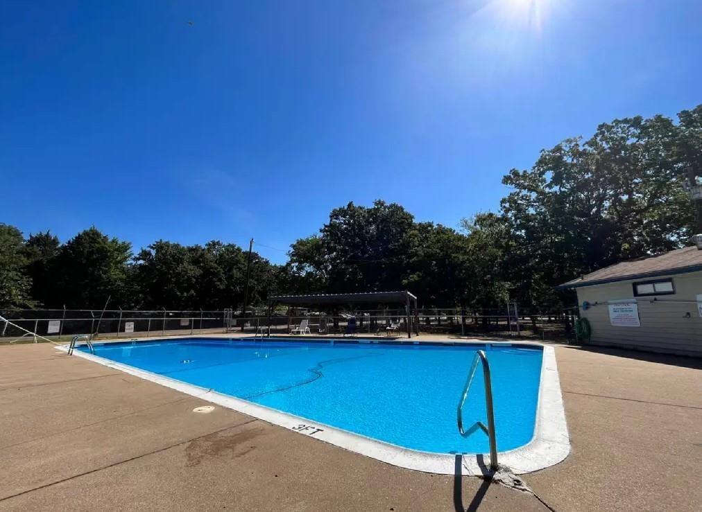 104 Red Bluff Loop Mabank, TX 75156 - Photo 5 of 8 a view of a tennis court