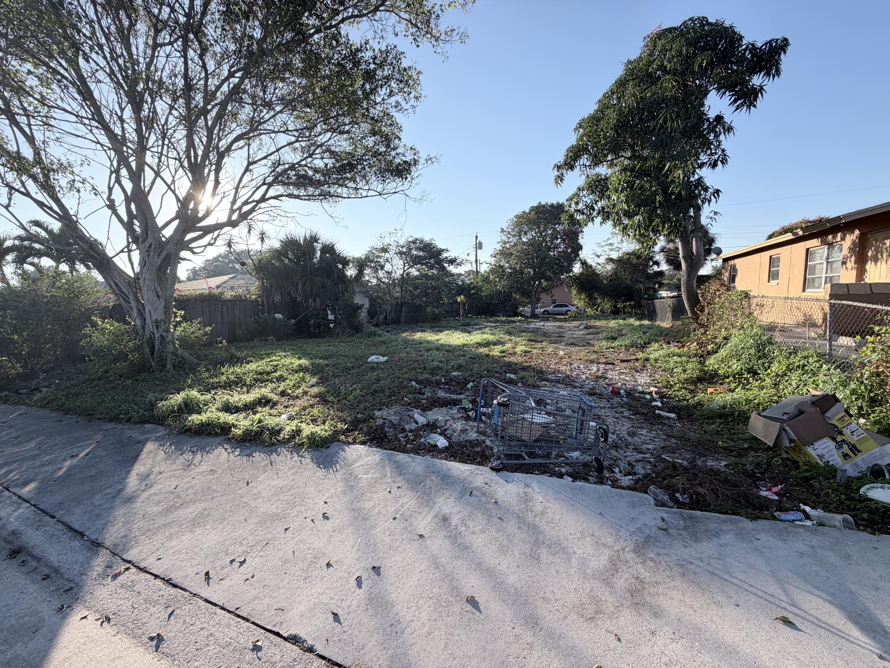 1149 West 34th Street Riviera Beach, FL 33404 - Photo 2 of 2 a big yard with lots of green space