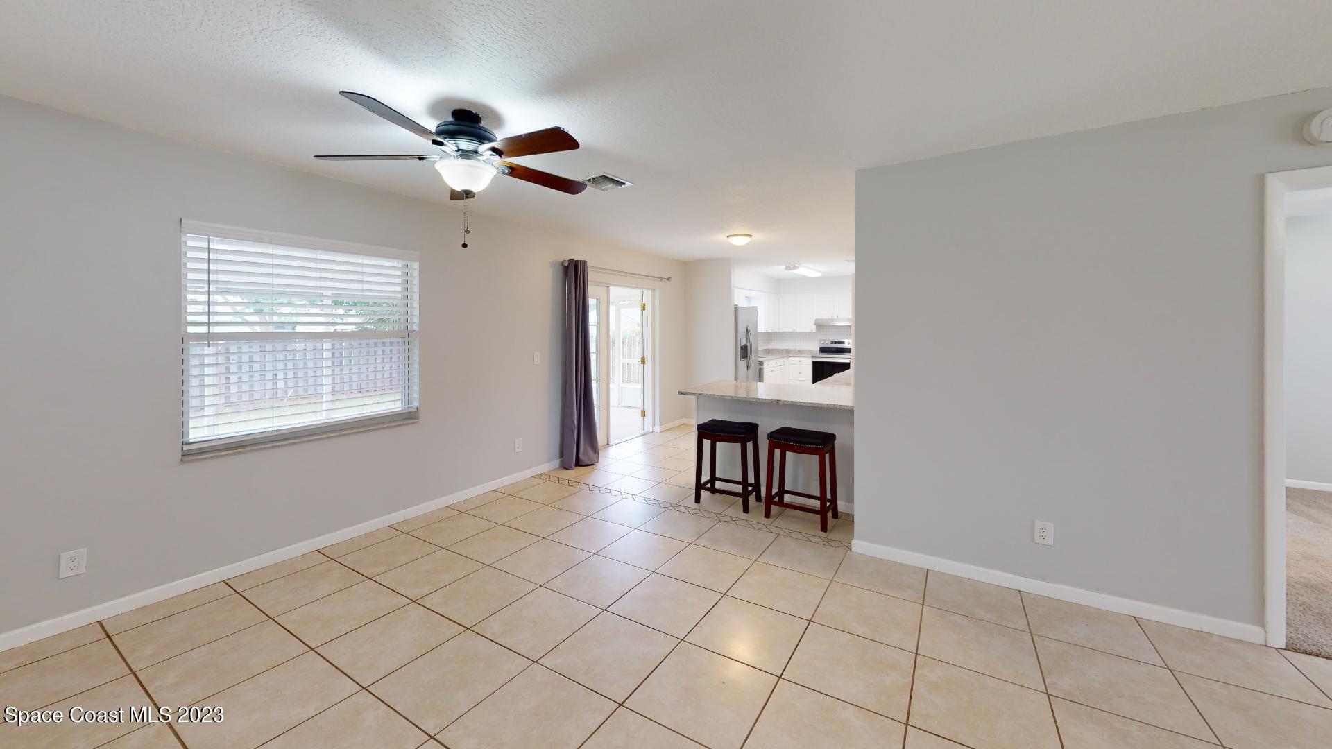 531 Trend Road Melbourne, FL 32904 - Photo 17 of 37 Great room to Kitchen - 1