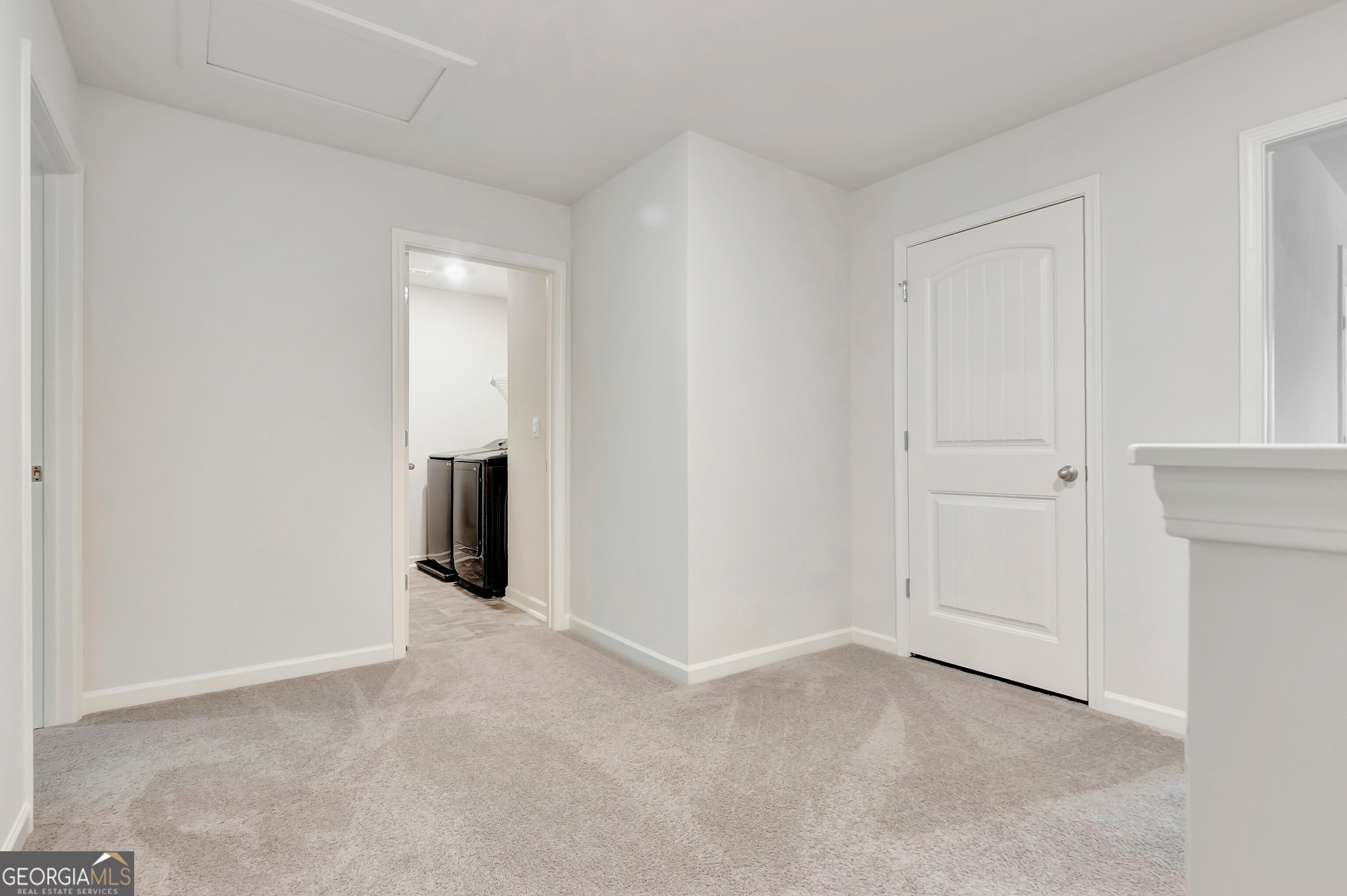 7730 Demeter Drive Fairburn, GA 30213 - Photo 30 of 47 a view of an empty room and closet area