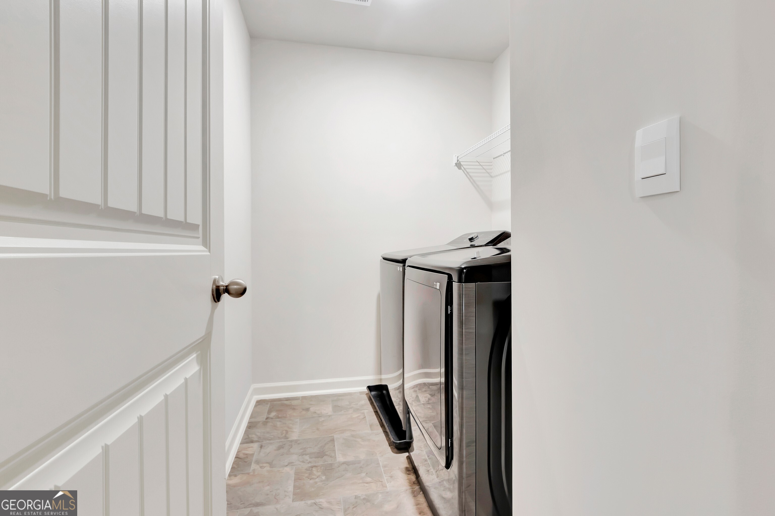 7730 Demeter Drive Fairburn, GA 30213 - Photo 31 of 47 a view of hallway with stairs