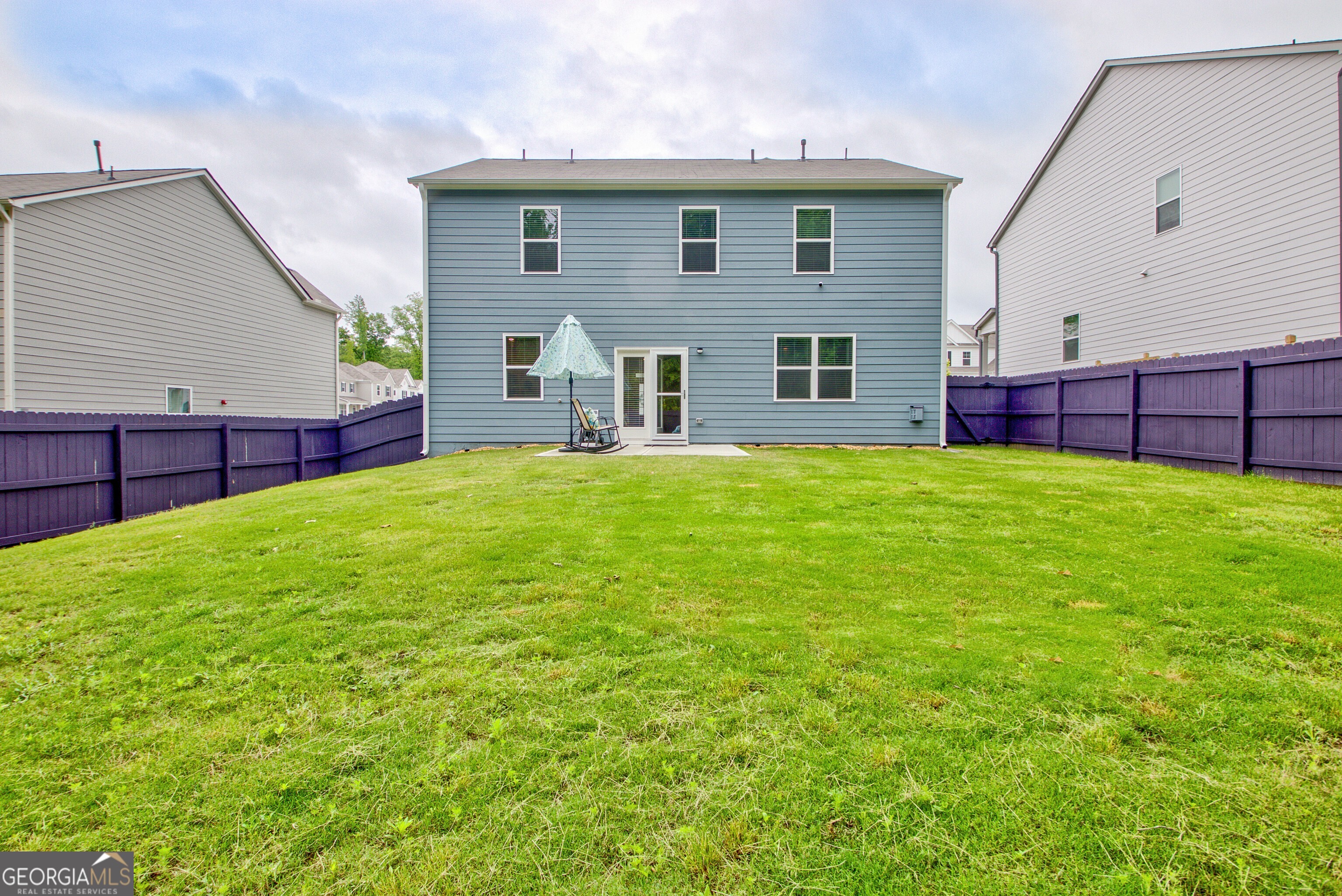 7730 Demeter Drive Fairburn, GA 30213 - Photo 41 of 47 a view of an house with backyard and a tree