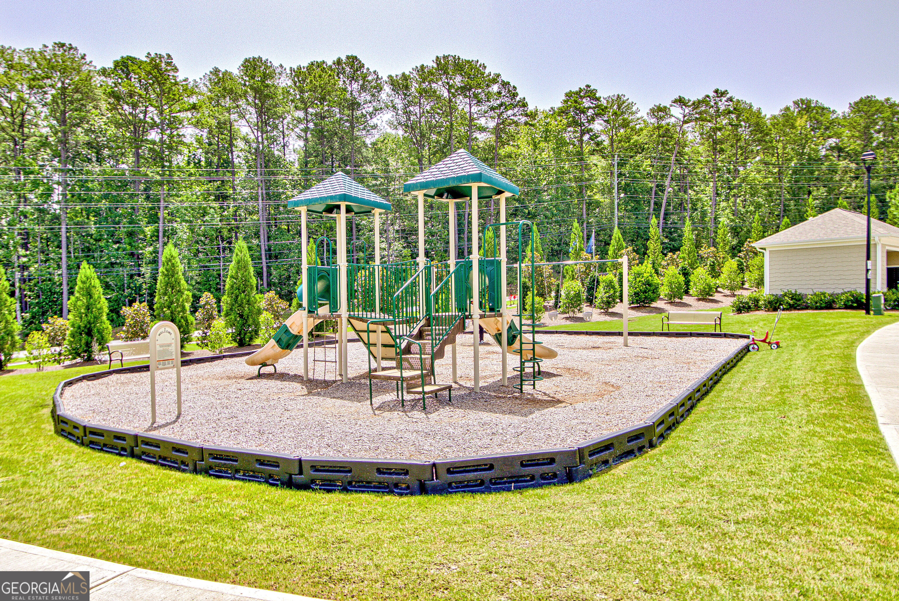7730 Demeter Drive Fairburn, GA 30213 - Photo 44 of 47 a view of a house with backyard and sitting area