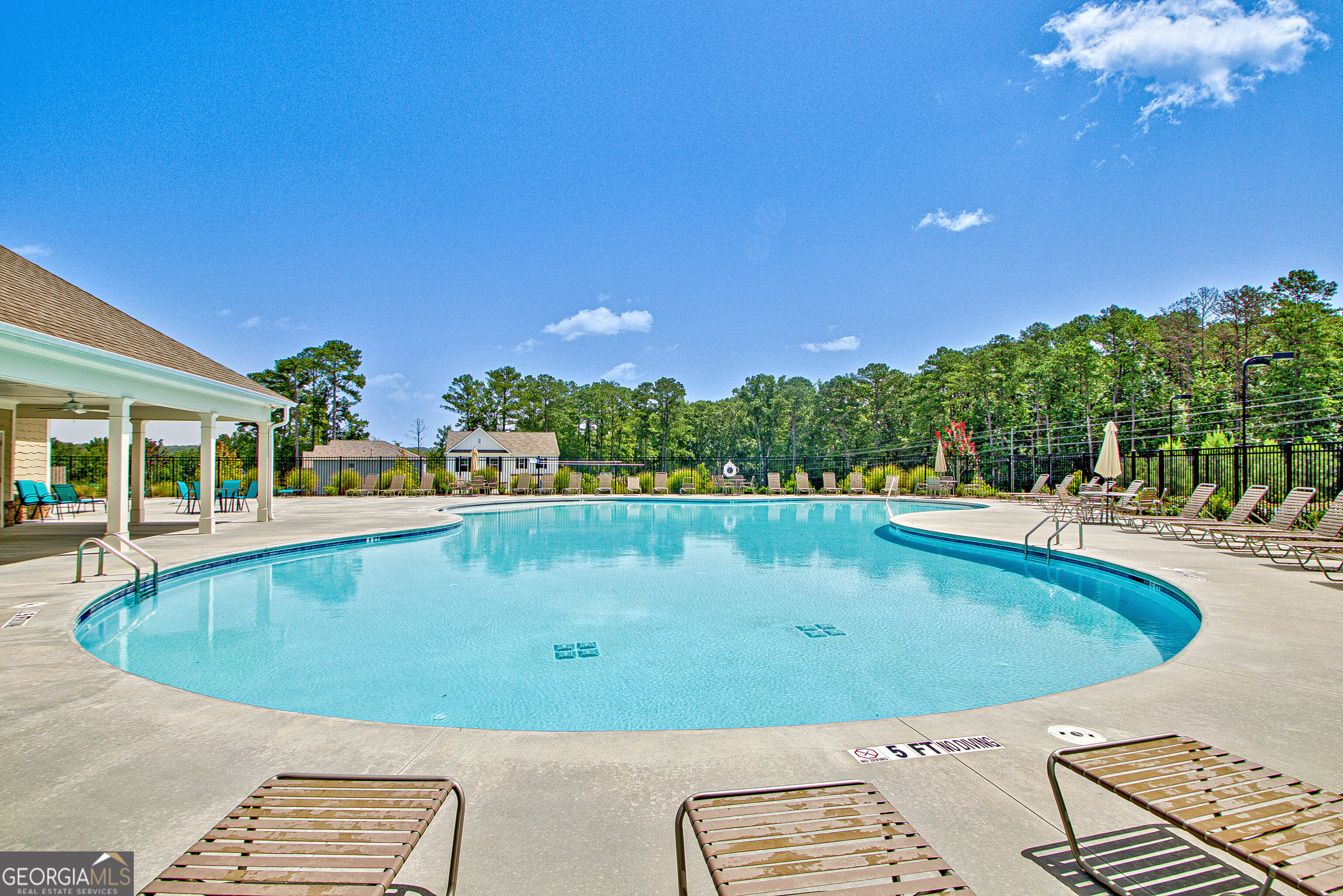 7730 Demeter Drive Fairburn, GA 30213 - Photo 47 of 47 a view of a swimming pool with a patio
