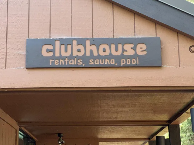 a living room with furniture flat screen tv and a large window