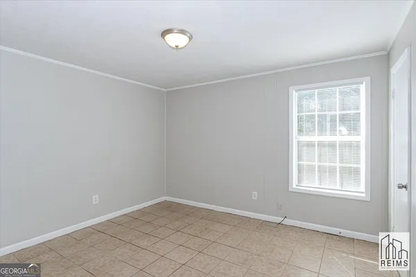 an empty room with windows