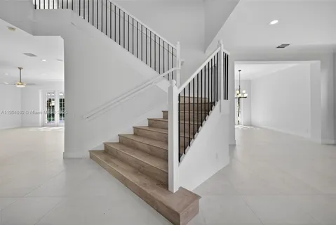 a view of staircase with white walls and white walls