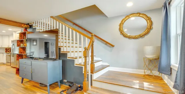 a view of a living room and bathroom