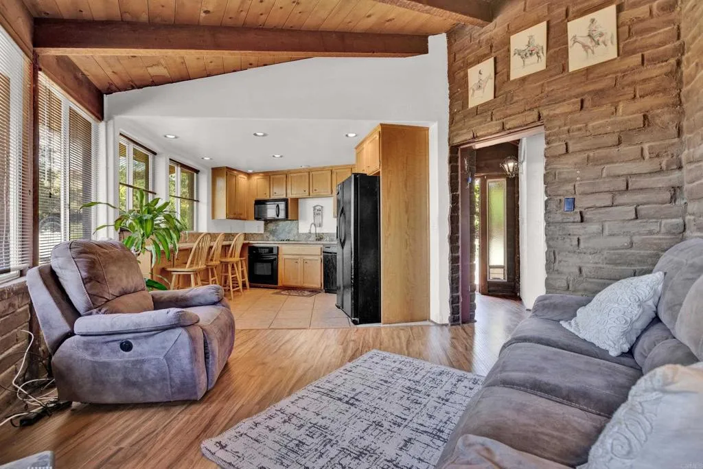 2951 Miramontes Road Jamul, CA 91935 - Photo 10 of 24 a living room with furniture and a rug