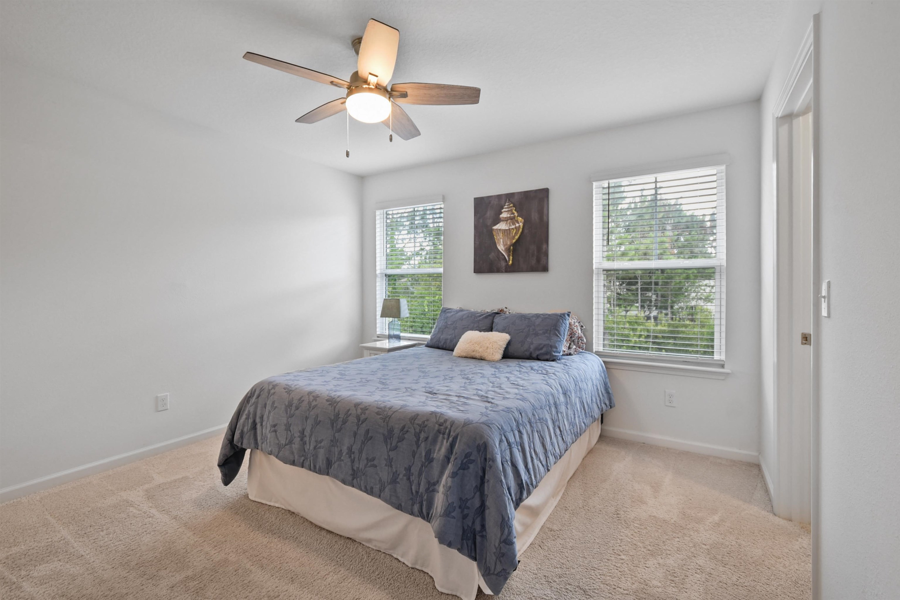 105 Ridge Lake Road St. Augustine, FL 32086 - Photo 17 of 34 a bedroom with a bed and a window