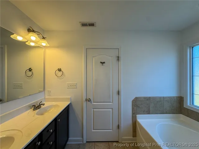 a bathroom with a tub