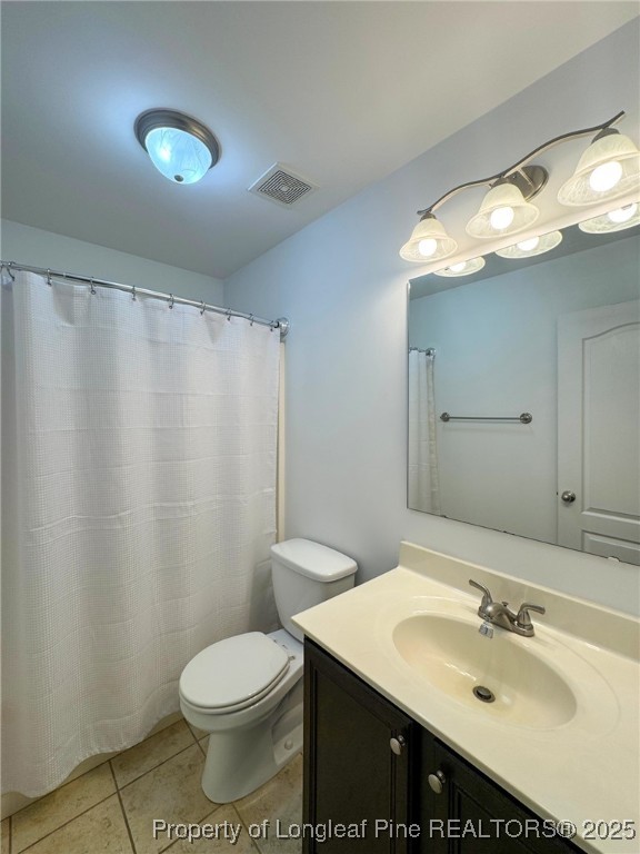 142 Crestwood Lane Raeford, NC 28376 - Photo 29 of 30 a bathroom with a sink toilet and mirror