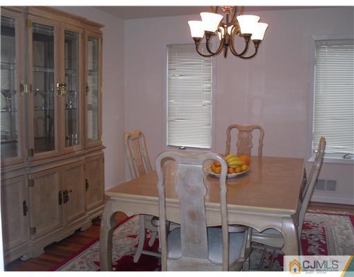 2 Mindy Road Edison, NJ 08820 - Photo 13 of 25 a view of dining room with chairs
