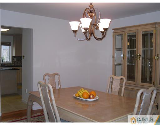 2 Mindy Road Edison, NJ 08820 - Photo 14 of 25 a dining room filled with furniture
