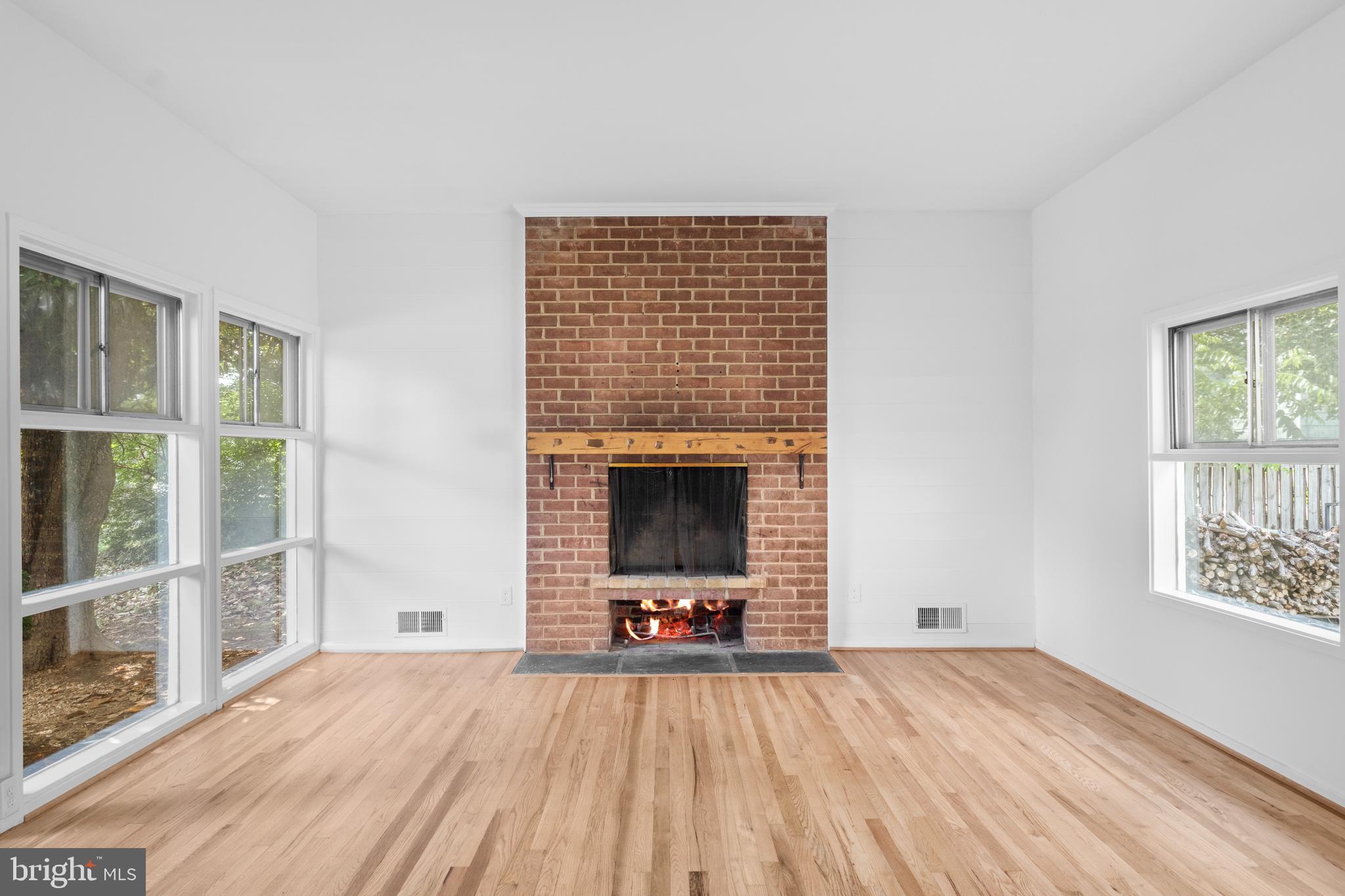 Inviting living room with wood fireplace